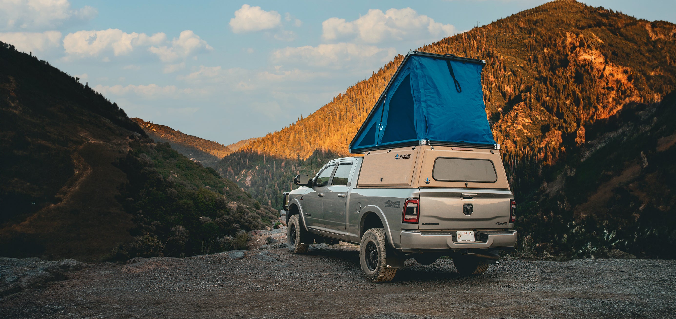 explore elevated Dodge Ram truck top camper